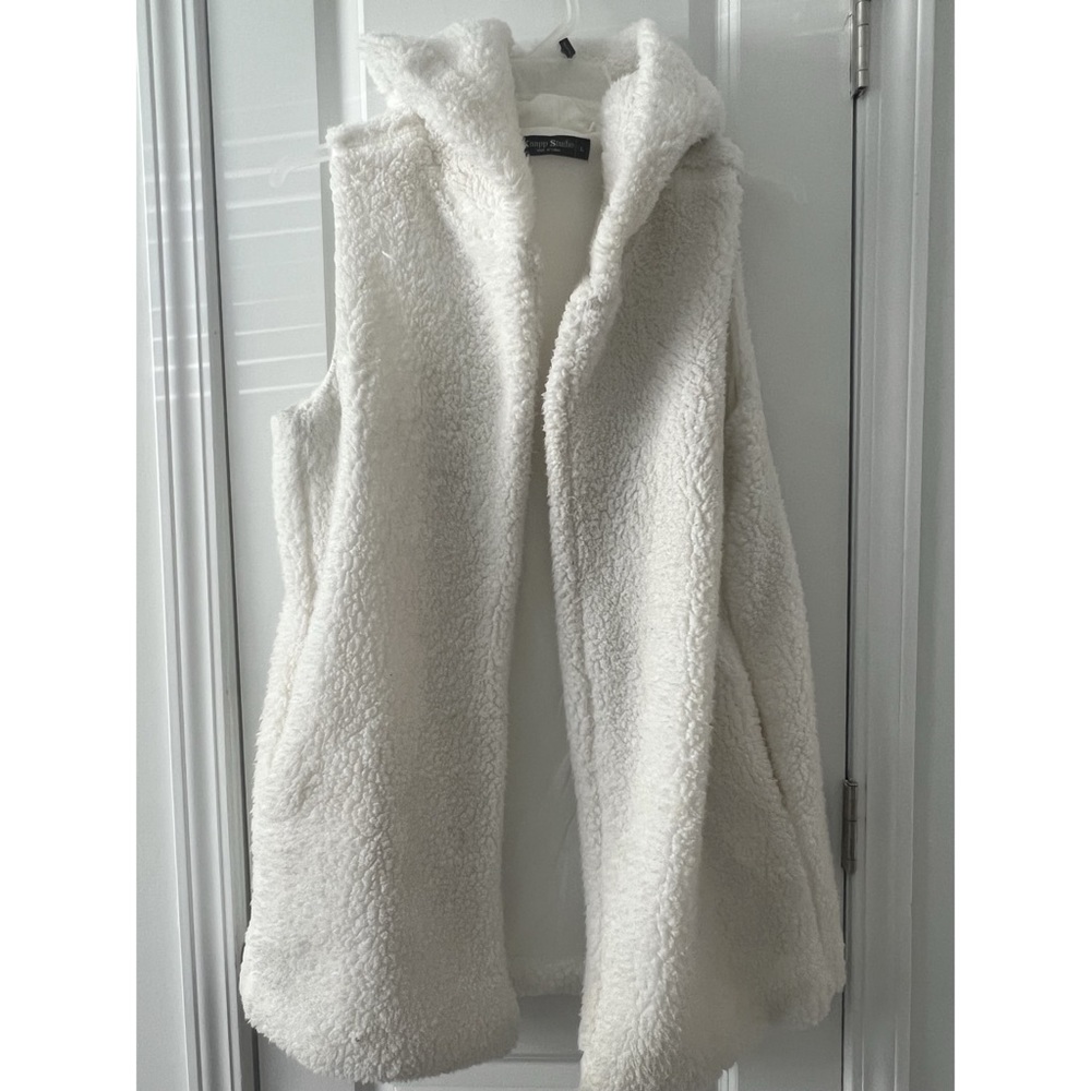 White sleeveless sherpa vest